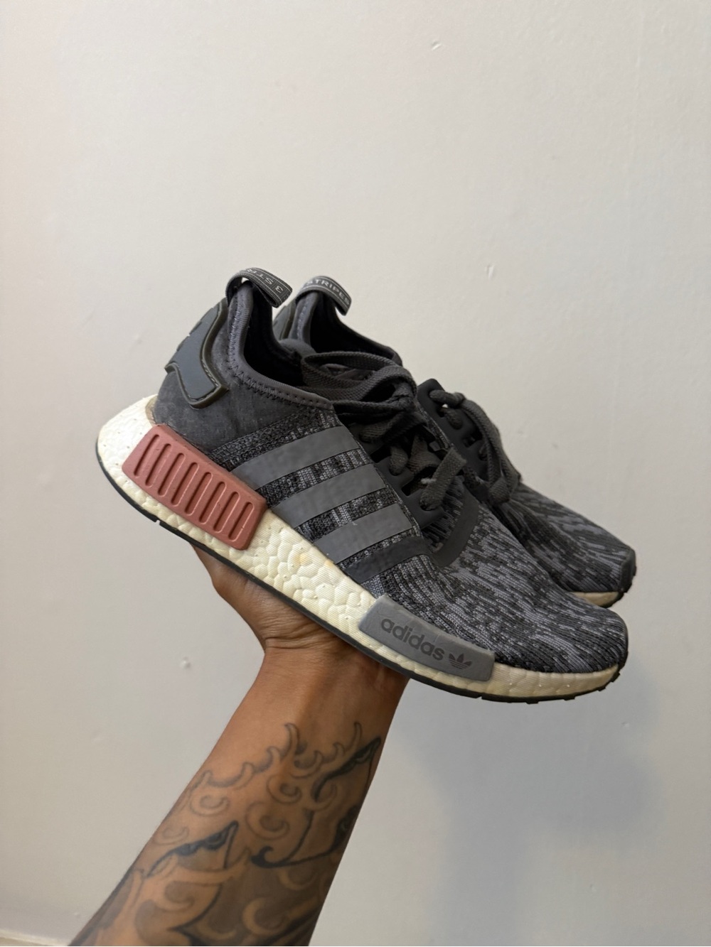 adidas Women’s Black/Grey Knit NMD_R1 Sneakers with Rose Accent